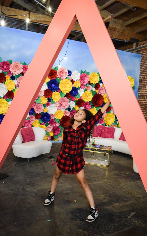 almay influencer event brand activation happy place fgpg young girl flower wall
