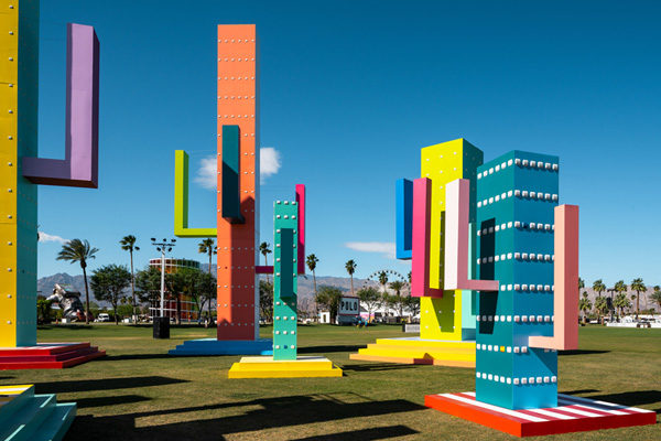 bright colored large cactus sculptures at coachella