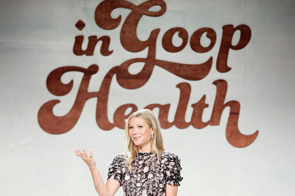 gwyneth paltrow presenting in front of an in goop health sign in regards to cannabis activism