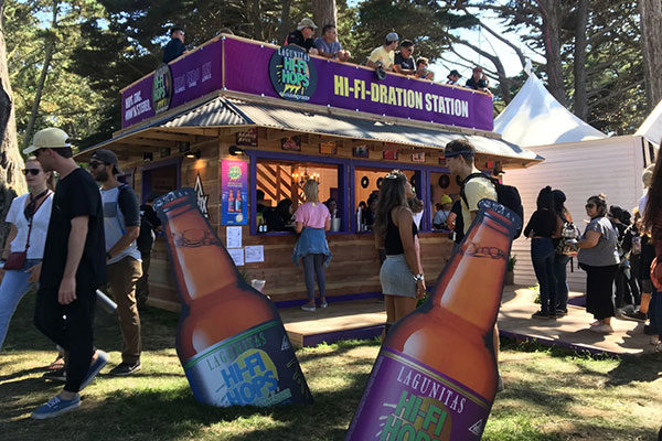 lagunitas hi-fi-dration pop-up at outside lands with beer bottle cardboard cutouts for cannabis experience