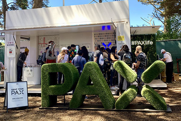 pax pop-up experience at outside lands with pax sign made of cannabis