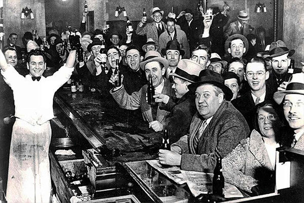 people celebrating the end of prohibition in a bar for cannabis
