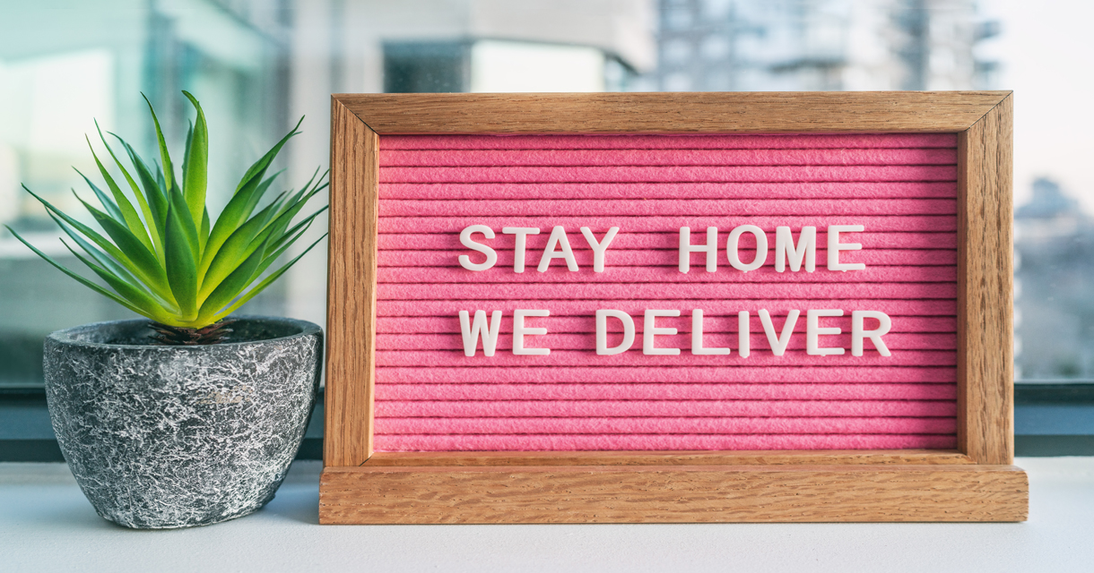 pink felt board sign that reads "stay home we deliver" with succulent plant to evolve the business