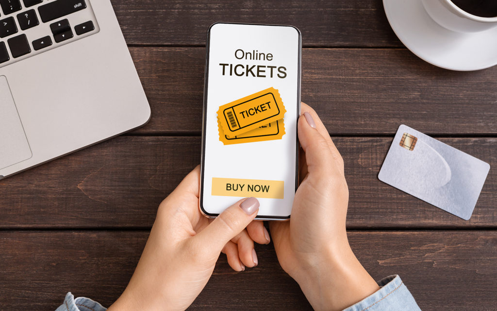 Smart phone showing online tickets for purchase on virtual event platform