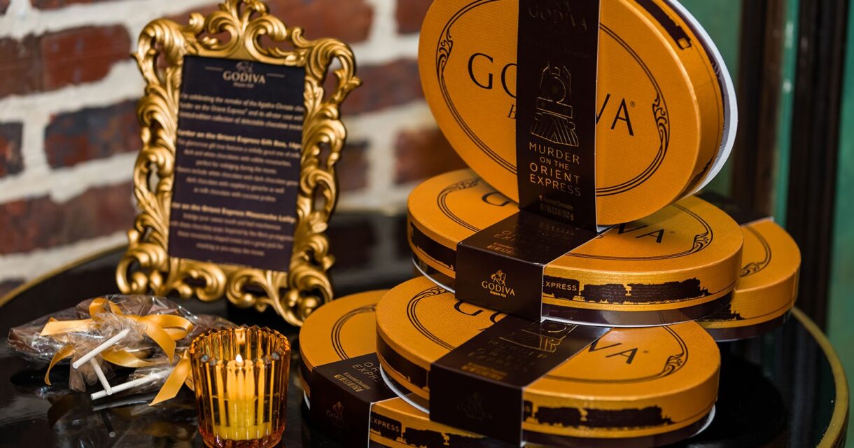 Image of boxes of Godiva chocolate on a table for a private screening on valentine's day