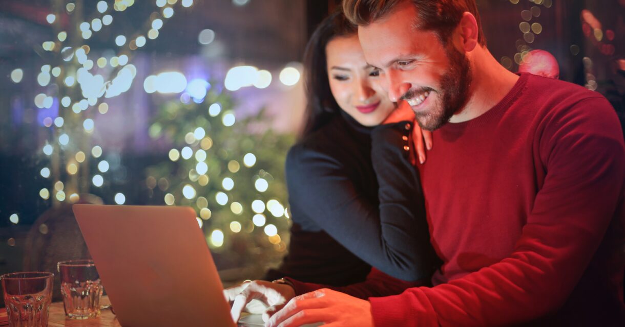 Image of a couple valentine's day shopping together on their laptop